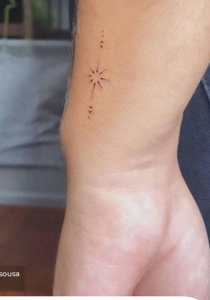Elegant Minimalist Star Burst Tattoo