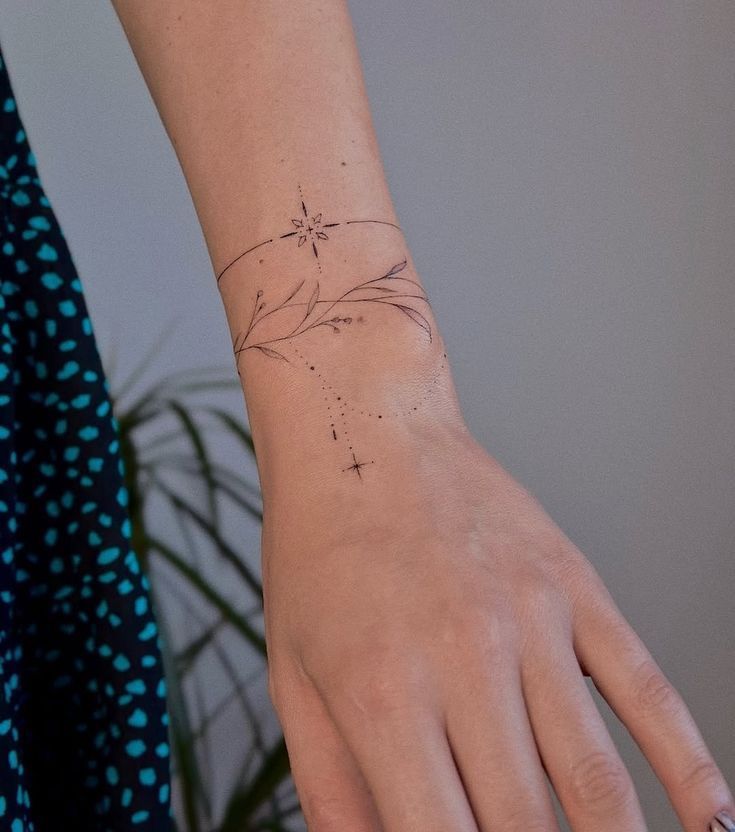 Elegant Star Wrap Wrist Tattoo