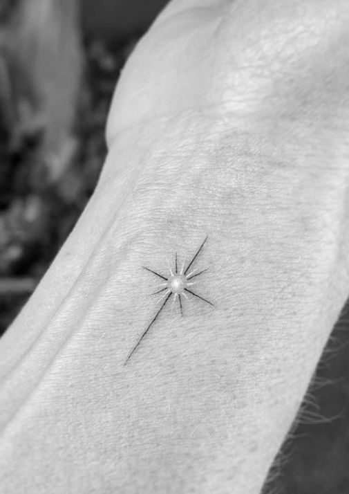 Elegant Minimalist Star Tattoo for the Wrist